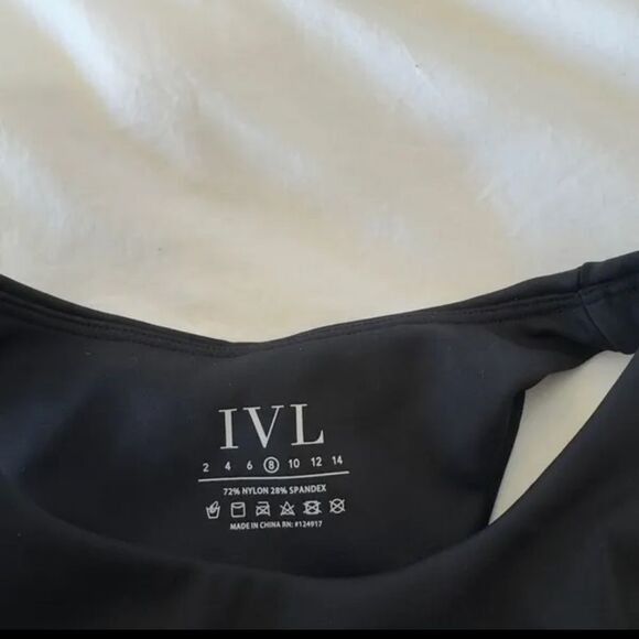 IVL Collective | Revolve | Curve Sports Bra in Jet Black & Brilliant White - Picture 4 of 7
